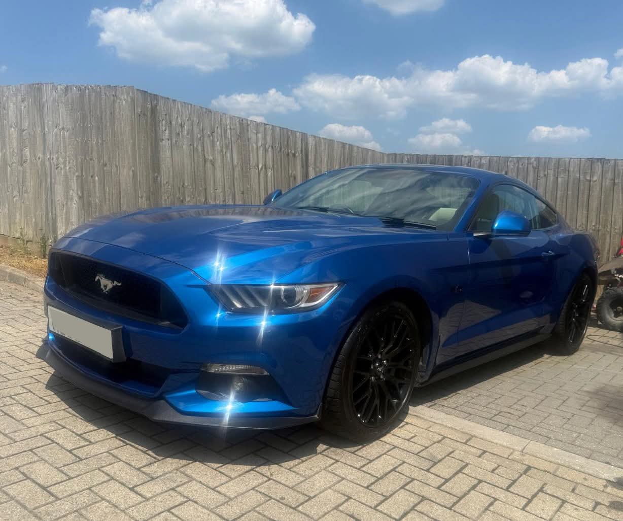 Blue Ford Mustang after gloss finish valeting