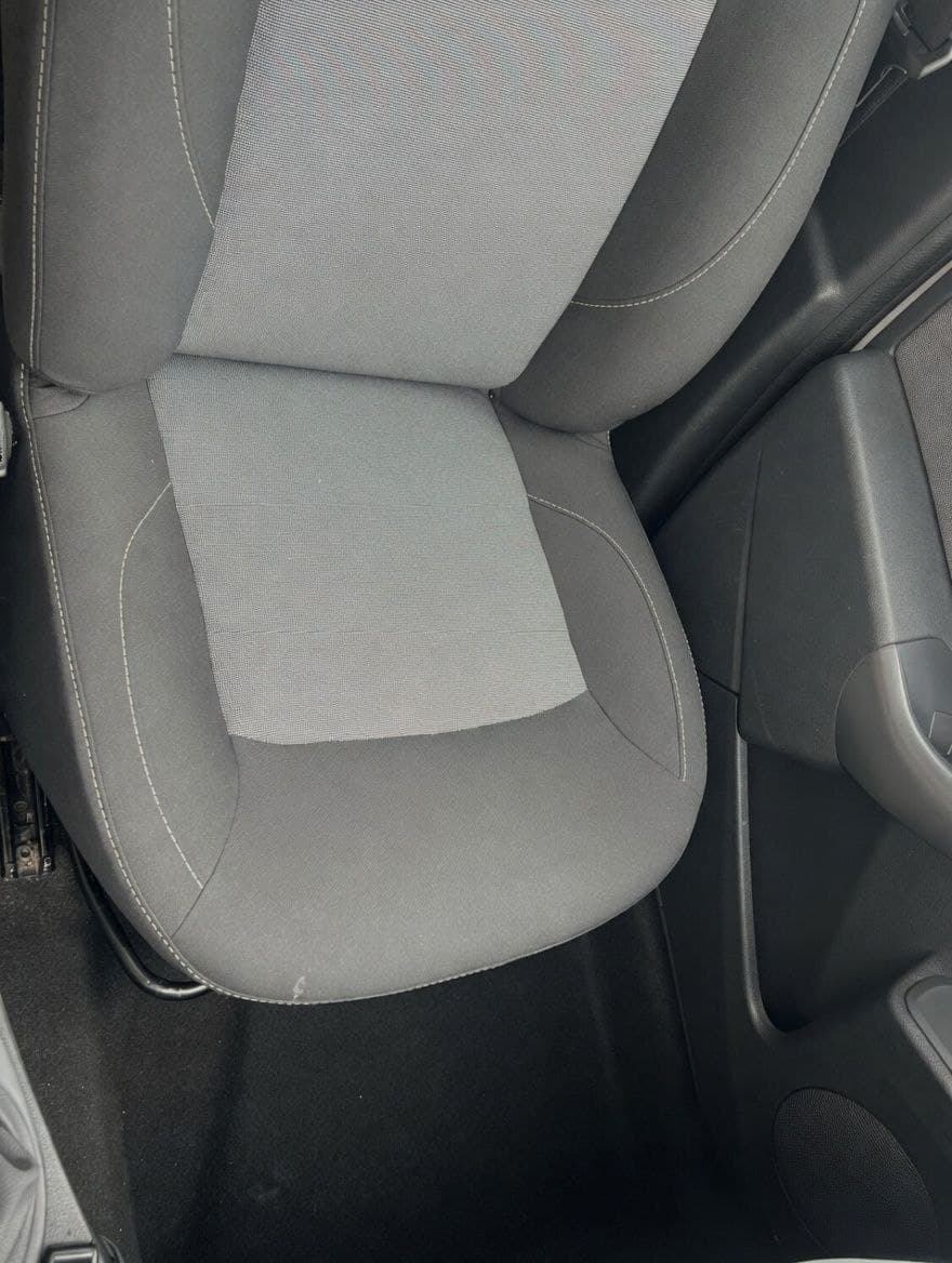 Car seat after deep clean, looking fresh and spotless